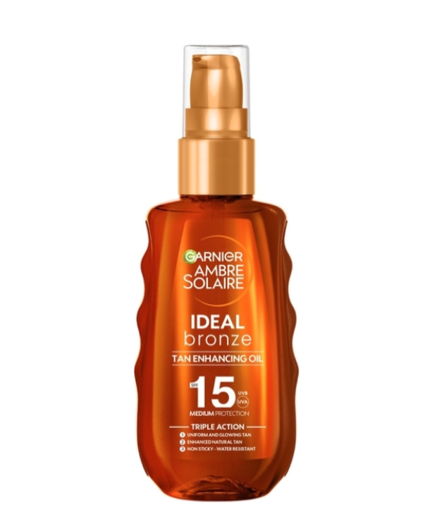 Lait solaire Garnier Ambre Solaire SPF 15 pour une protection solaire moyenne, bouteille blanche avec logo orange et jaune.