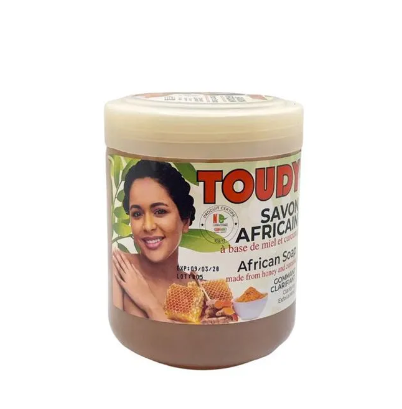 Savon Noir Africain Toudy, savon naturel pour visage et corps, texture sombre et riche, idéal pour nettoyage en profondeur.